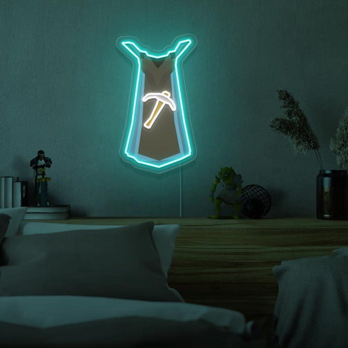 Mount the Runescape Mining Skillcape LED neon sign above your bed to inspire dreams of mastering the mining profession in Old School RuneScape. The iconic Mining Skillcape represents expertise and dedication. A perfect addition to any bedroom, this LED neon sign infuses the space with authenticity and ambition. 