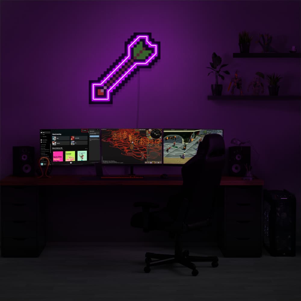  Illuminate your gaming setup with the Runescape Protect from Range LED neon sign mounted above a gaming PC. The protective spell icon symbolizes defense against ranged attacks in Old School RuneScape. A perfect addition to the room, this LED neon sign enhances the ambiance for RS enthusiasts.
