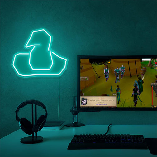 The Runescape Wizard Hat LED neon sign proudly sits next to a gaming PC, symbolizing the magic and mystique of wizards in RuneScape. An emblem of arcane knowledge and power, this LED neon sign adds a touch of enchantment and wonder to any gaming space.